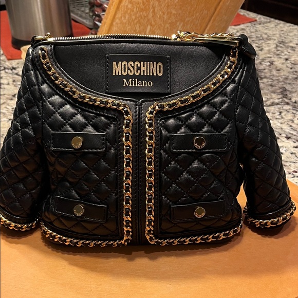 Moschino Handbags - Moschino Black Quilted Mini Jacket Bag with Gold Chain Trim